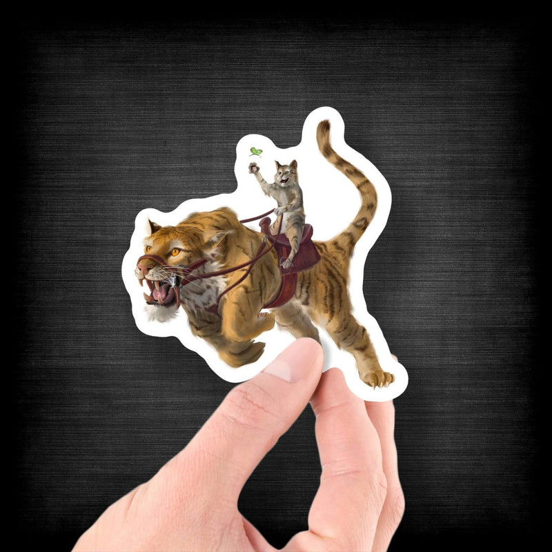 Cat Riding a Prehistoric Cat (Chasing Butterflies) - Vinyl Sticker - Dan Pearce Sticker Shop