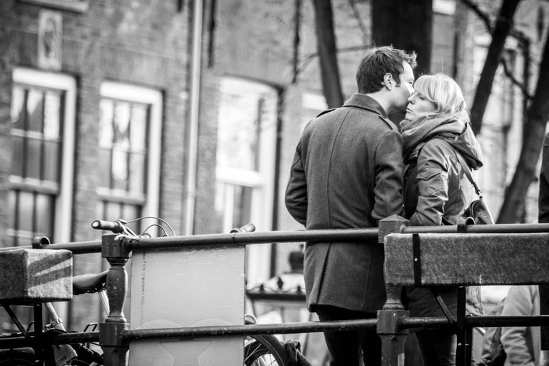 Photo Print: A Couple Has a Moment at the Amsterdam Canals - Dan Pearce Sticker Shop